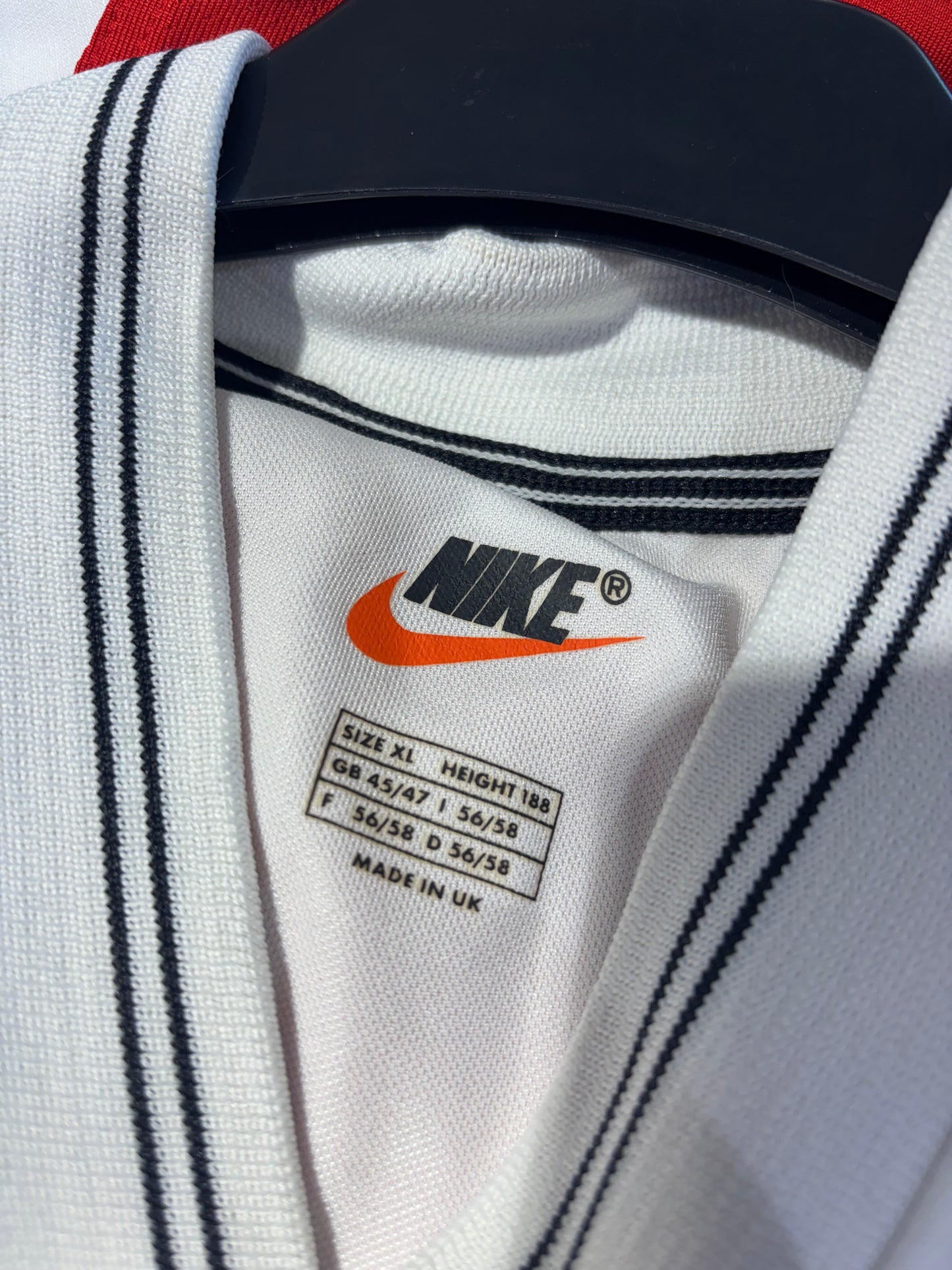 Close-up of Poland national team eagle crest badge on Nike 1998 home football shirt