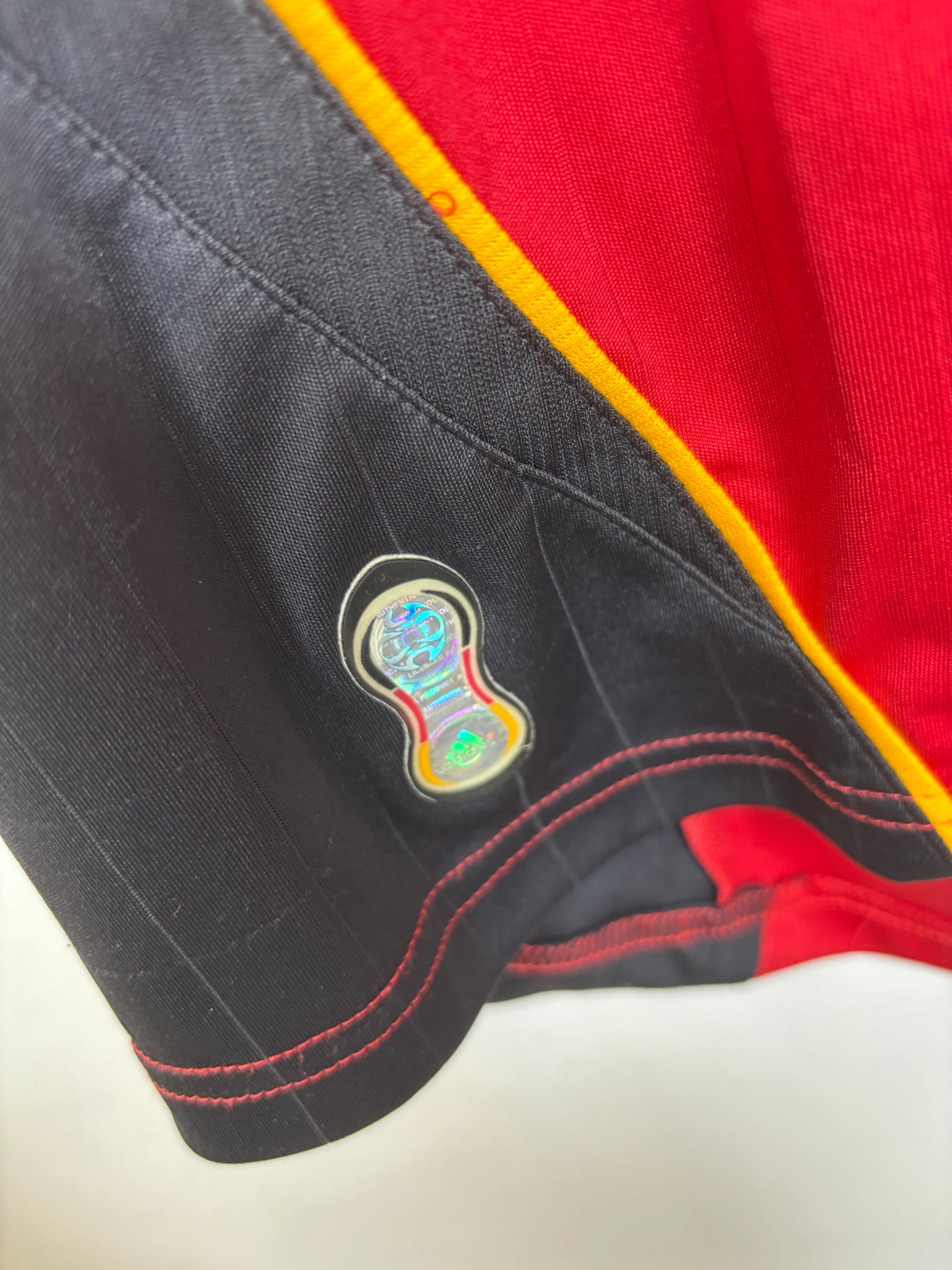 Germany 2006 away shirt sponsor detail and Adidas three stripes on white Ballack jersey