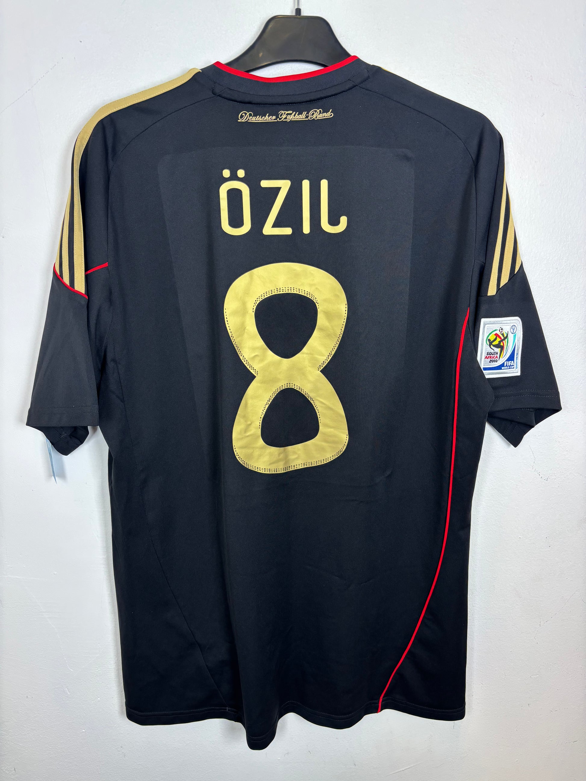 Back view of Adidas Germany 2010 away shirt displaying Ozil name and number 8