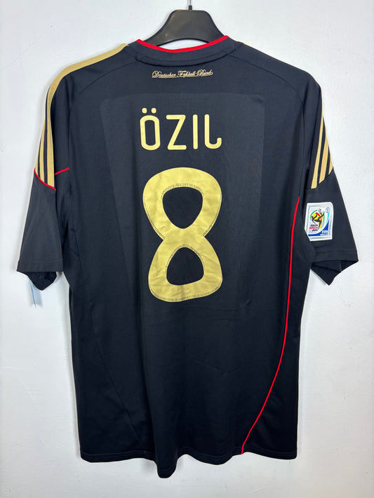 Back view of Adidas Germany 2010 away shirt displaying Ozil name and number 8