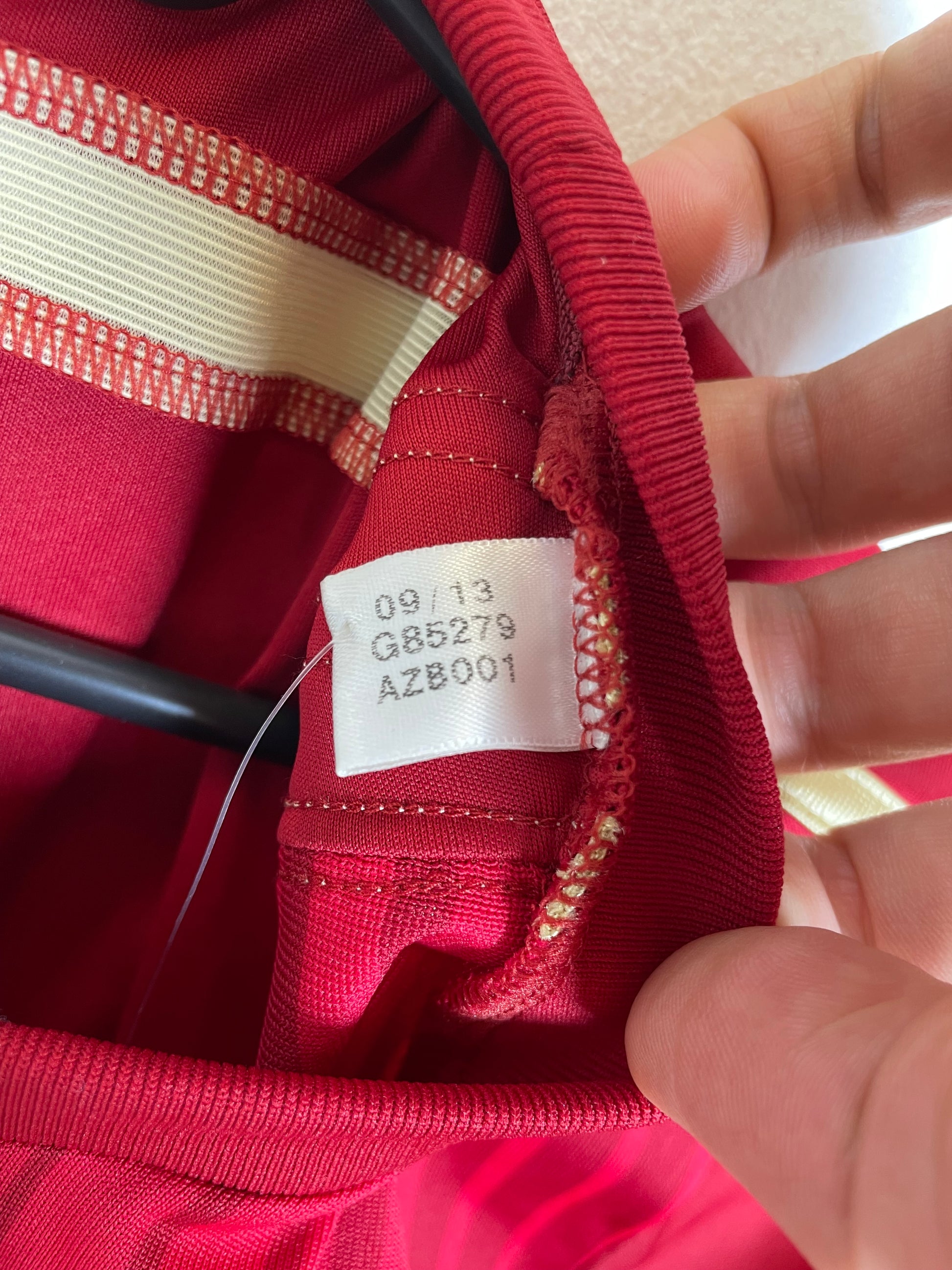 Adidas branding and sizing details visible on Spain 2014 World Cup home jersey with Villa 7