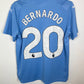 Back view of Manchester City home shirt 23/24 showing Bernardo name and number 20