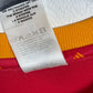 Close-up detail of Adidas Spain 2002 home shirt showing fabric texture and construction quality