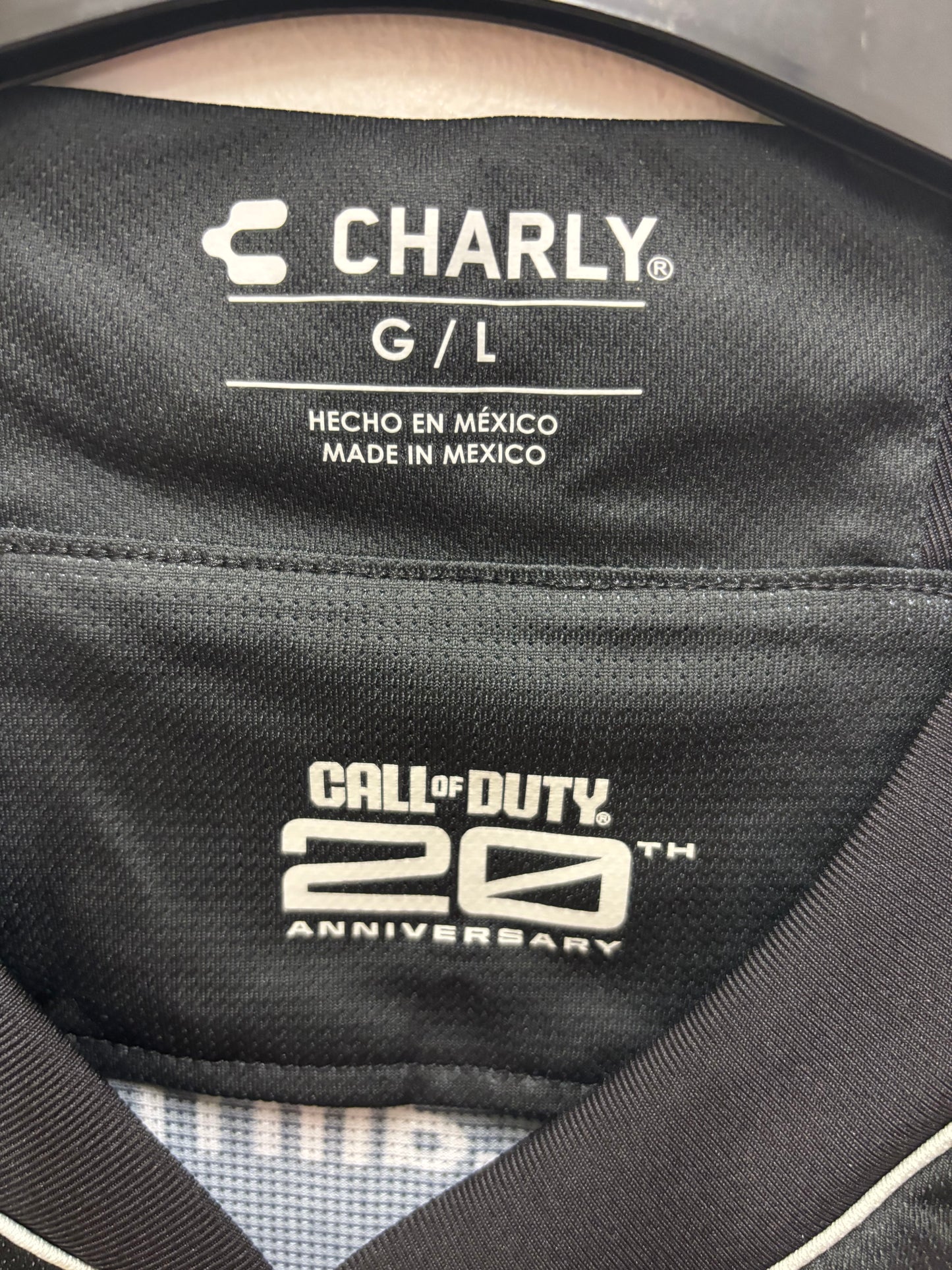Black bag with Charly and Call of Duty logos on a gray background