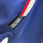 Fabric texture and material quality detail of Ajax 1999/2000 away shirt with Laudrup 10