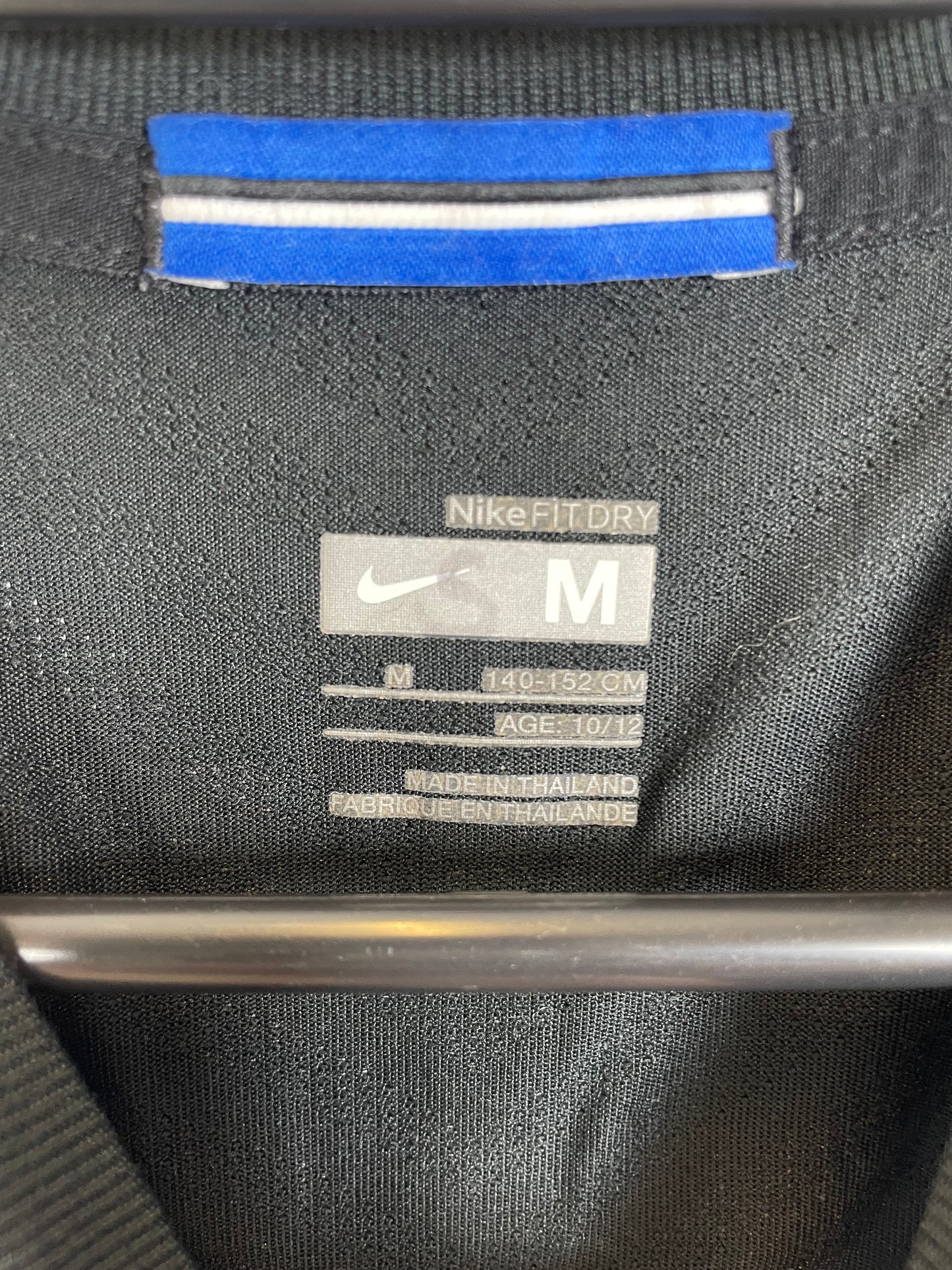 Manchester United club badge and Nike logo detail on 2009/10 away shirt with Macheda 27