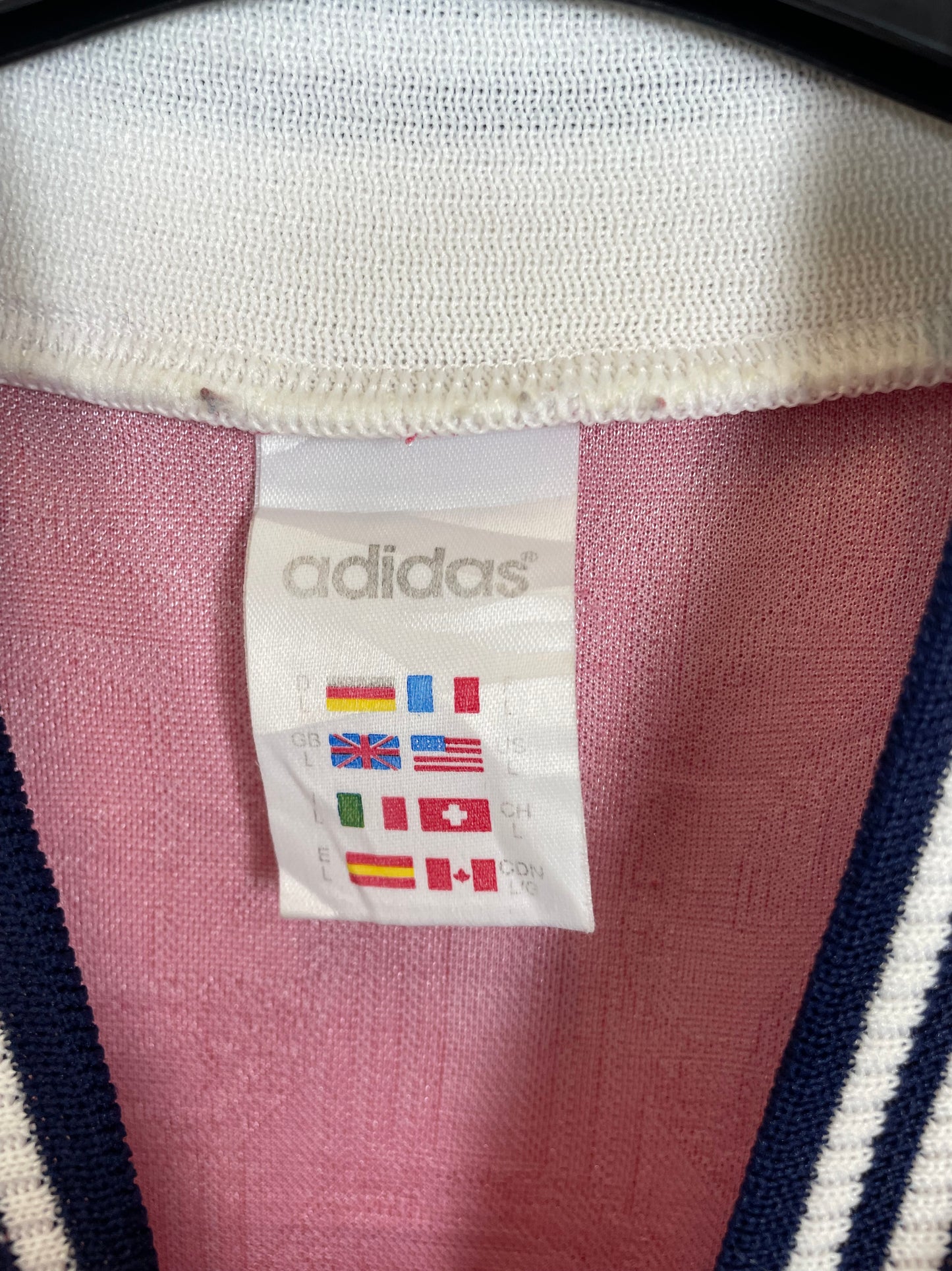 Close-up of Norway national team crest on Adidas 1996 home football shirt showing lion emblem detail