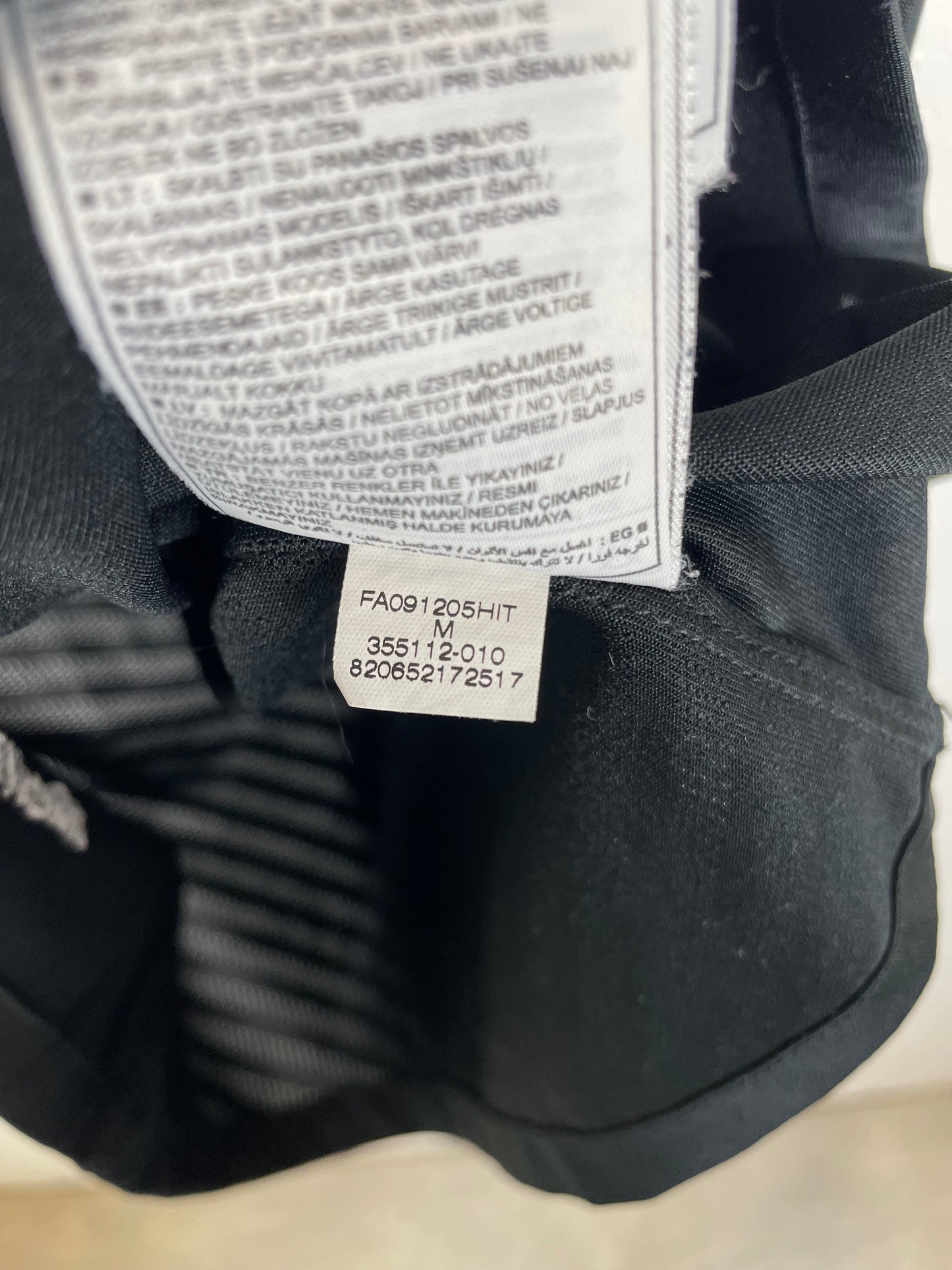 Interior sizing label and Nike manufacturer tag detail of Manchester United 09/10 away Macheda shirt
