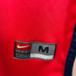 Arsenal 99/00 home shirt sponsor logo and sleeve details on vintage Nike jersey