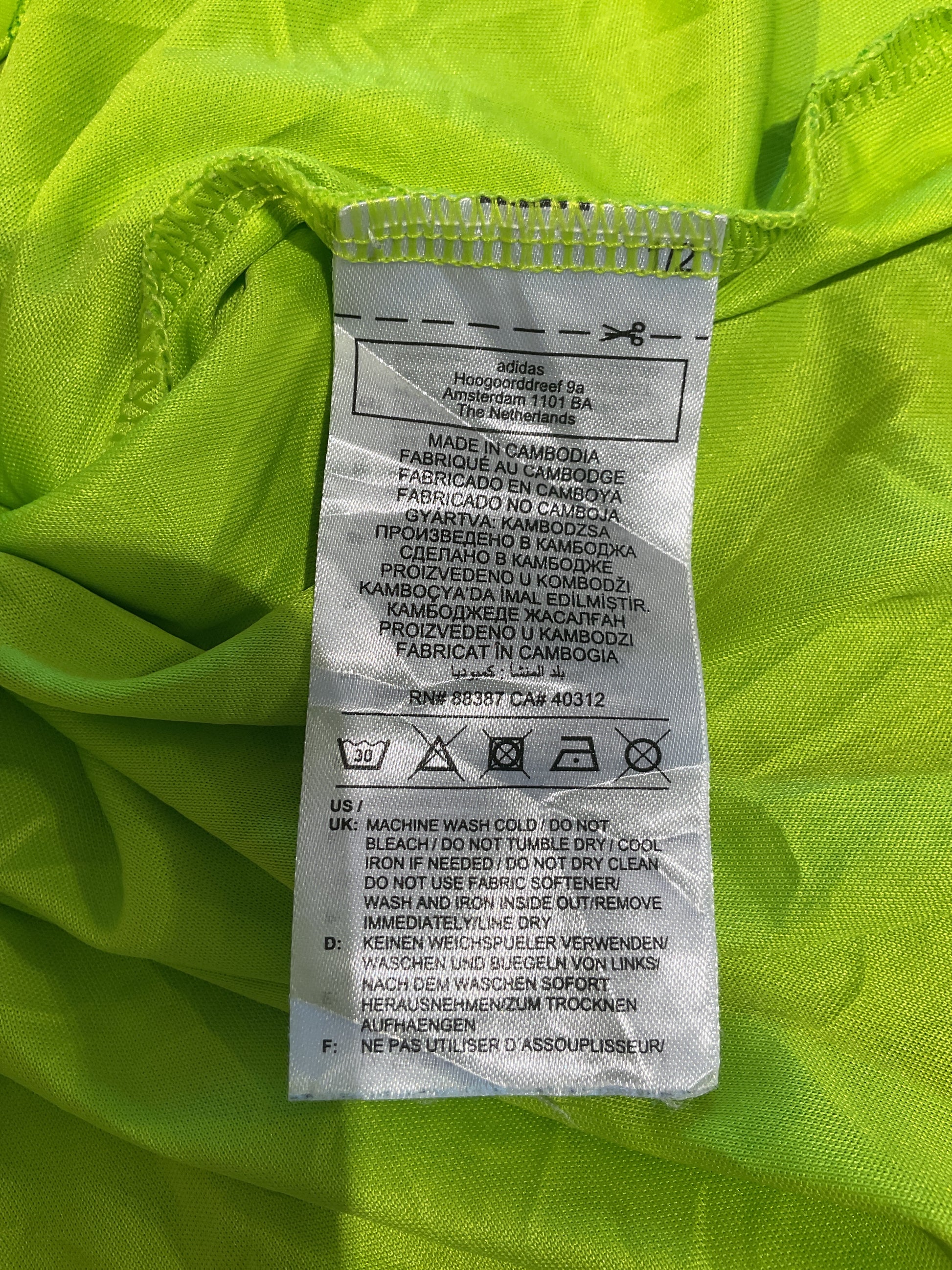 Close-up of a label on bright green fabric