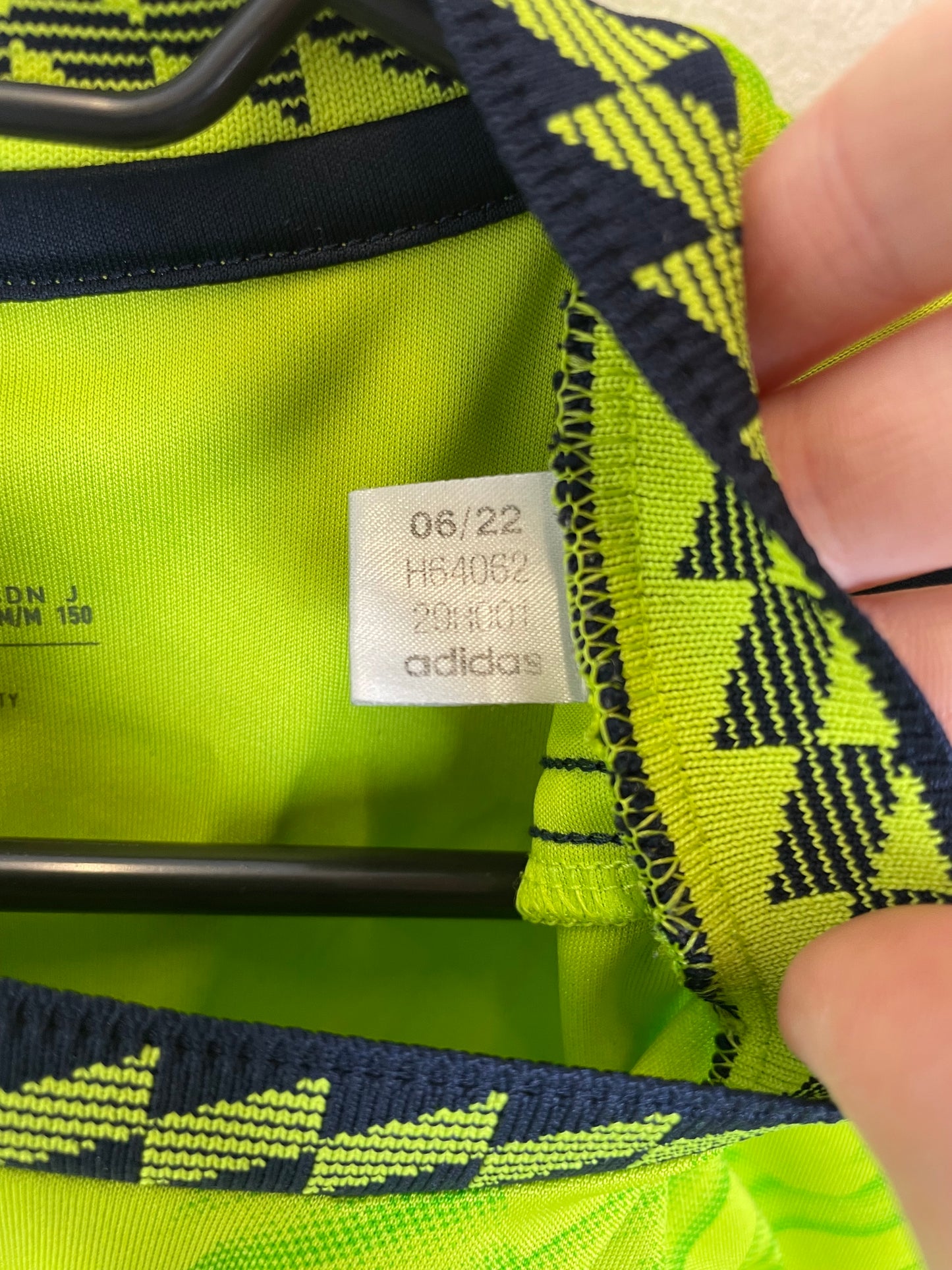Manchester United third kit 22/23 shirt detail showing Antony 21 name and number, kids size 11-12Y