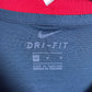 Close-up of Nike swoosh and Club América eagle badge detailing on 20/21 pre-match kit