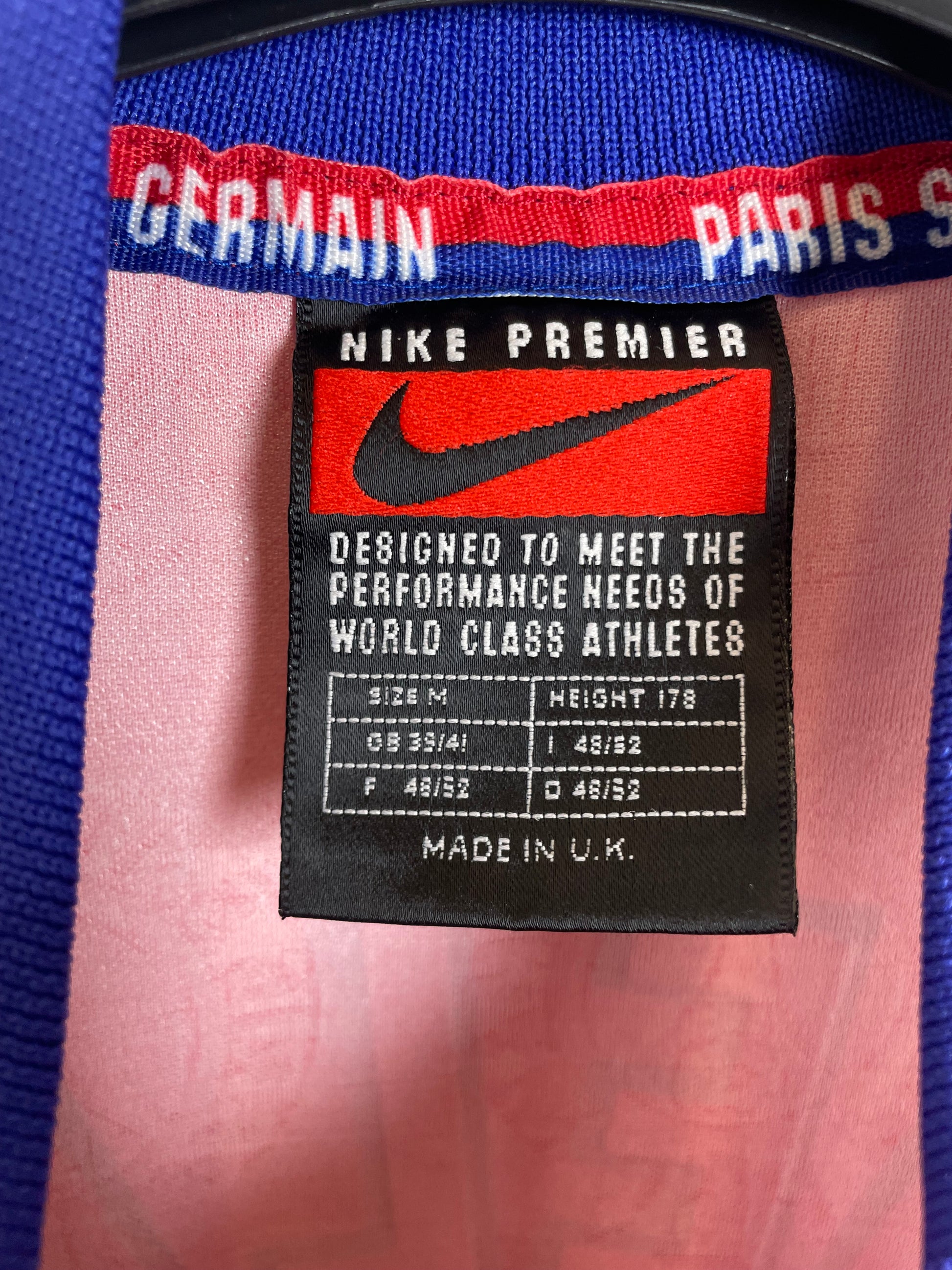 PSG 96/97 away — Nike Swoosh and Paris Saint-Germain crest detail
