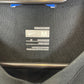 Close-up of Nike logo and Manchester United club badge on 2009/11 away shirt