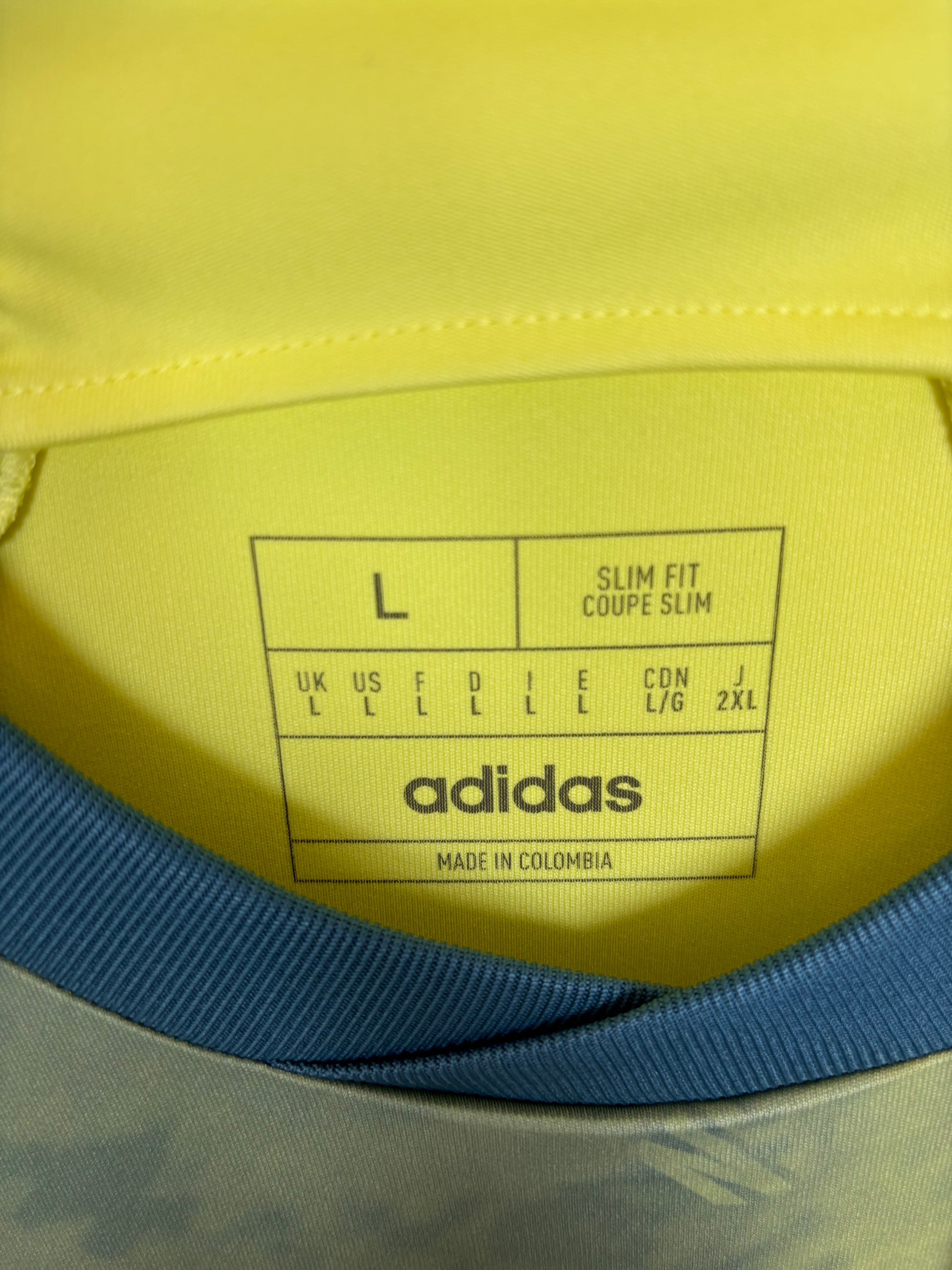 Close-up of Adidas logo and New York Red Bulls club badge on 2022 away shirt with Forsberg 10