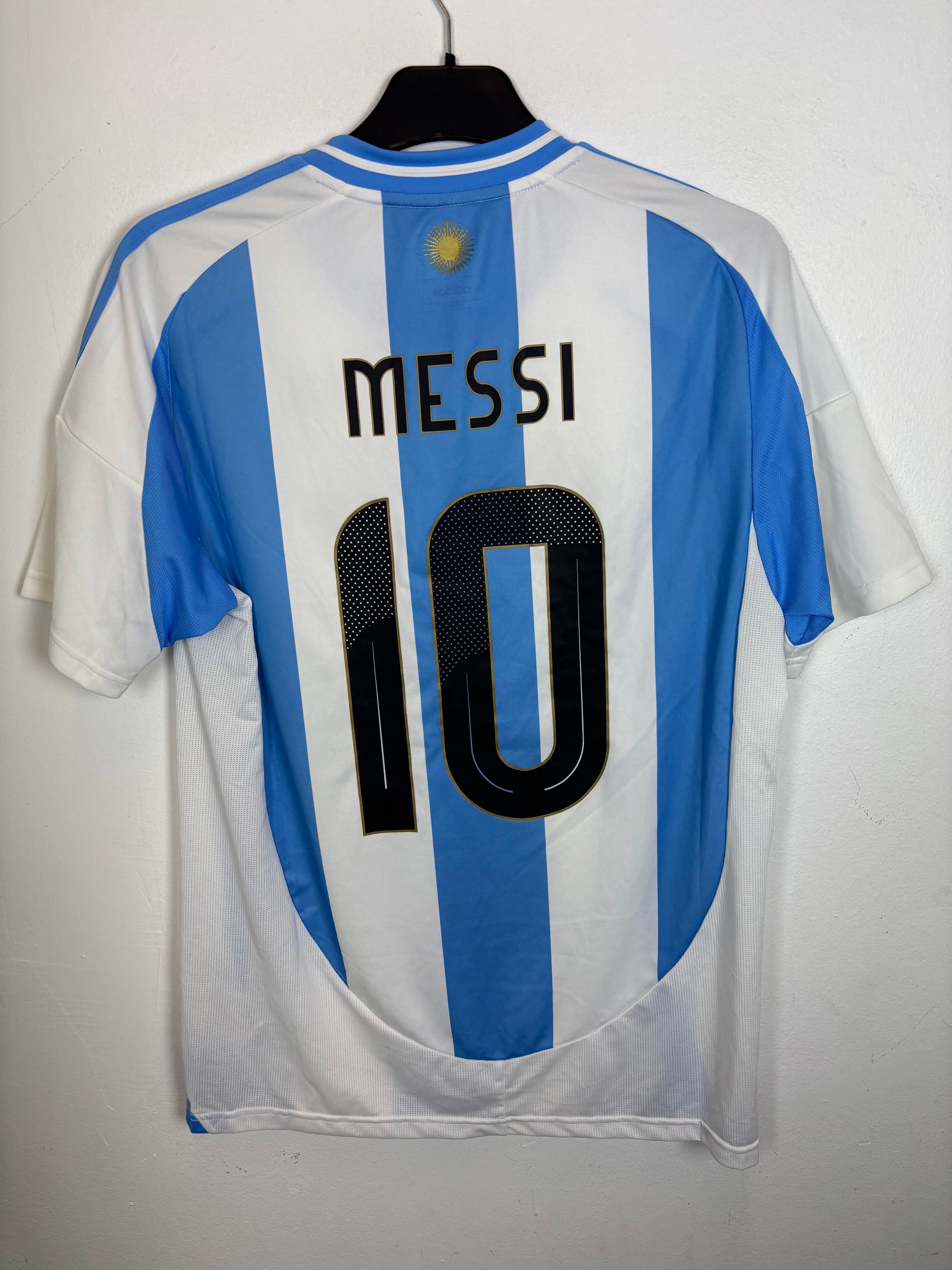 Back view of Adidas Argentina home shirt 2024 showing Messi name and number 10 in excellent condition