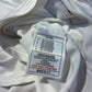 Nike swoosh logo and sizing tag detail on Poland national team 1998 home football jersey