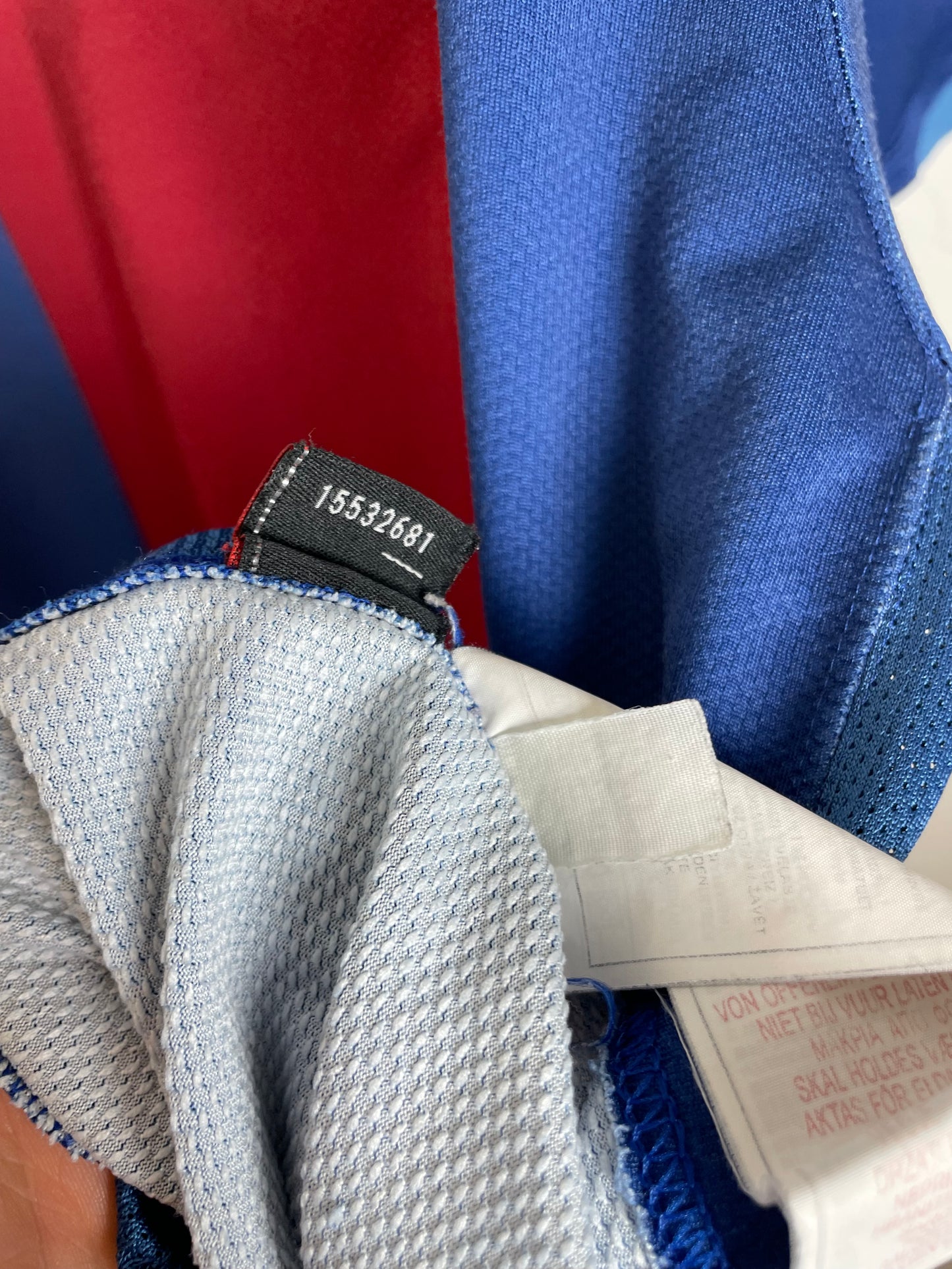 Interior label showing Nike branding and size XL tag of authentic Barcelona 06/07 Ronaldinho shirt