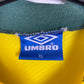 Close-up of Brazil national team badge and Umbro logo on 1993 yellow home football shirt