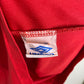Manchester United 98/00 home shirt sponsor logo and Premier League patches detail view