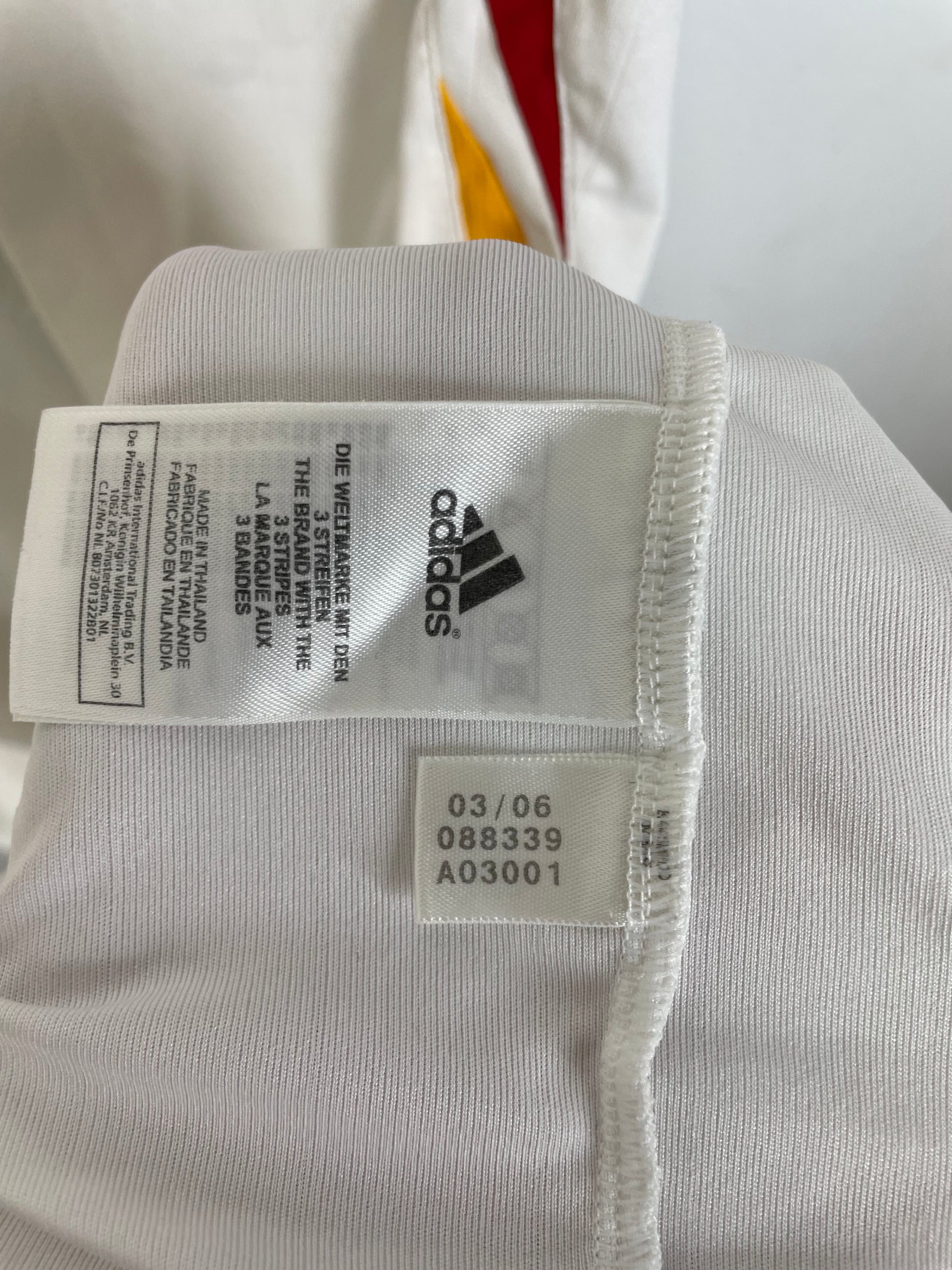 Interior size XXL label and Adidas manufacturing tags inside Germany 2006 Mertesacker home shirt