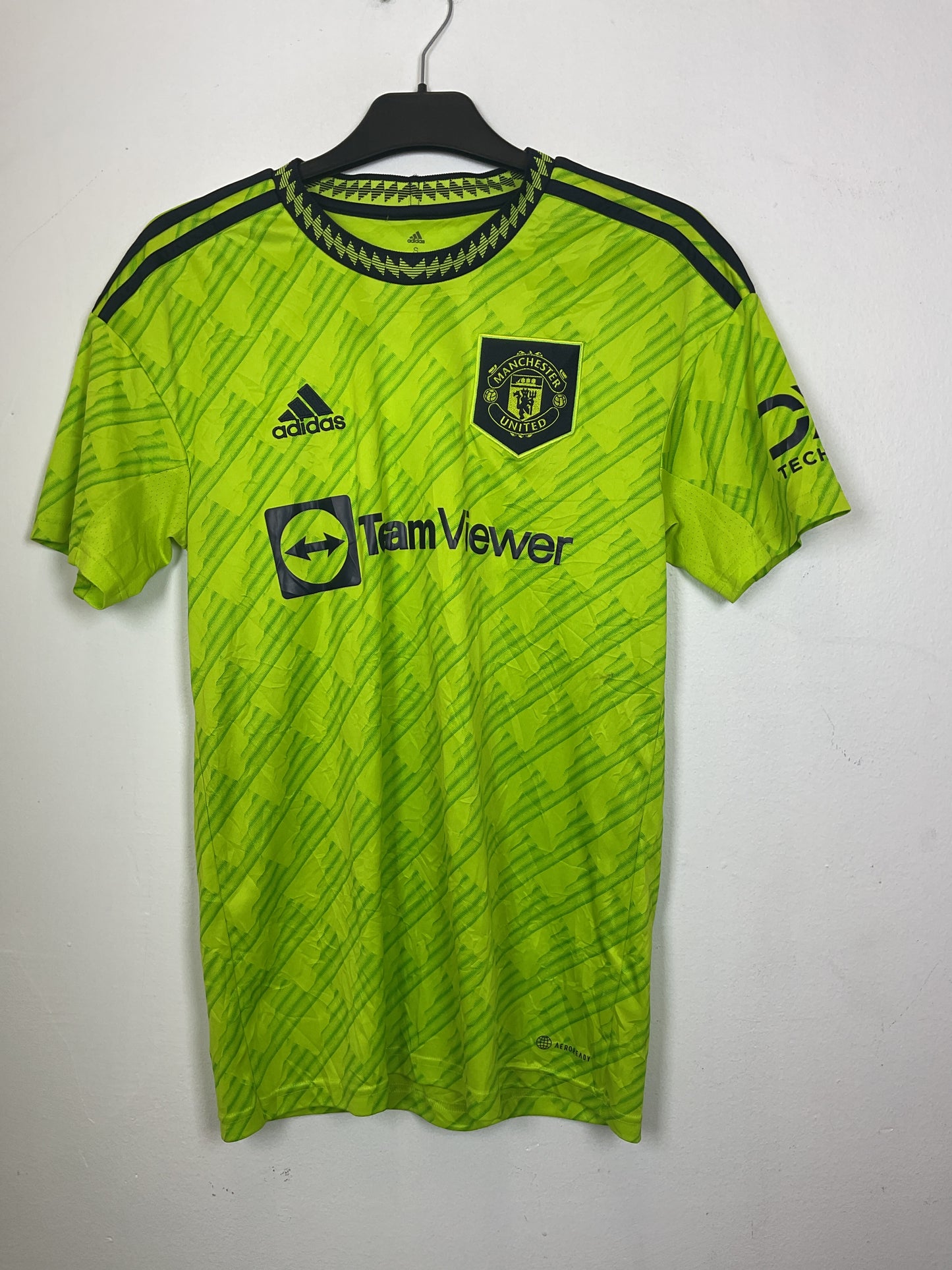 Green Manchester United football jersey women's with Adidas and TeamViewer logos on a white background