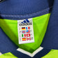 Close-up of Adidas logo and Fulham club badge on 1999/2000 away shirt with Horsfield 9