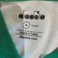 Diadora label on a green and white sports bag