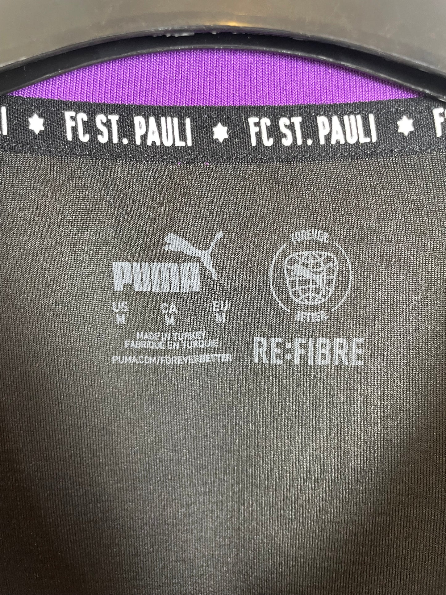 St.Pauli 24/25 third — Puma branding and rainbow FC St.Pauli crest detail
