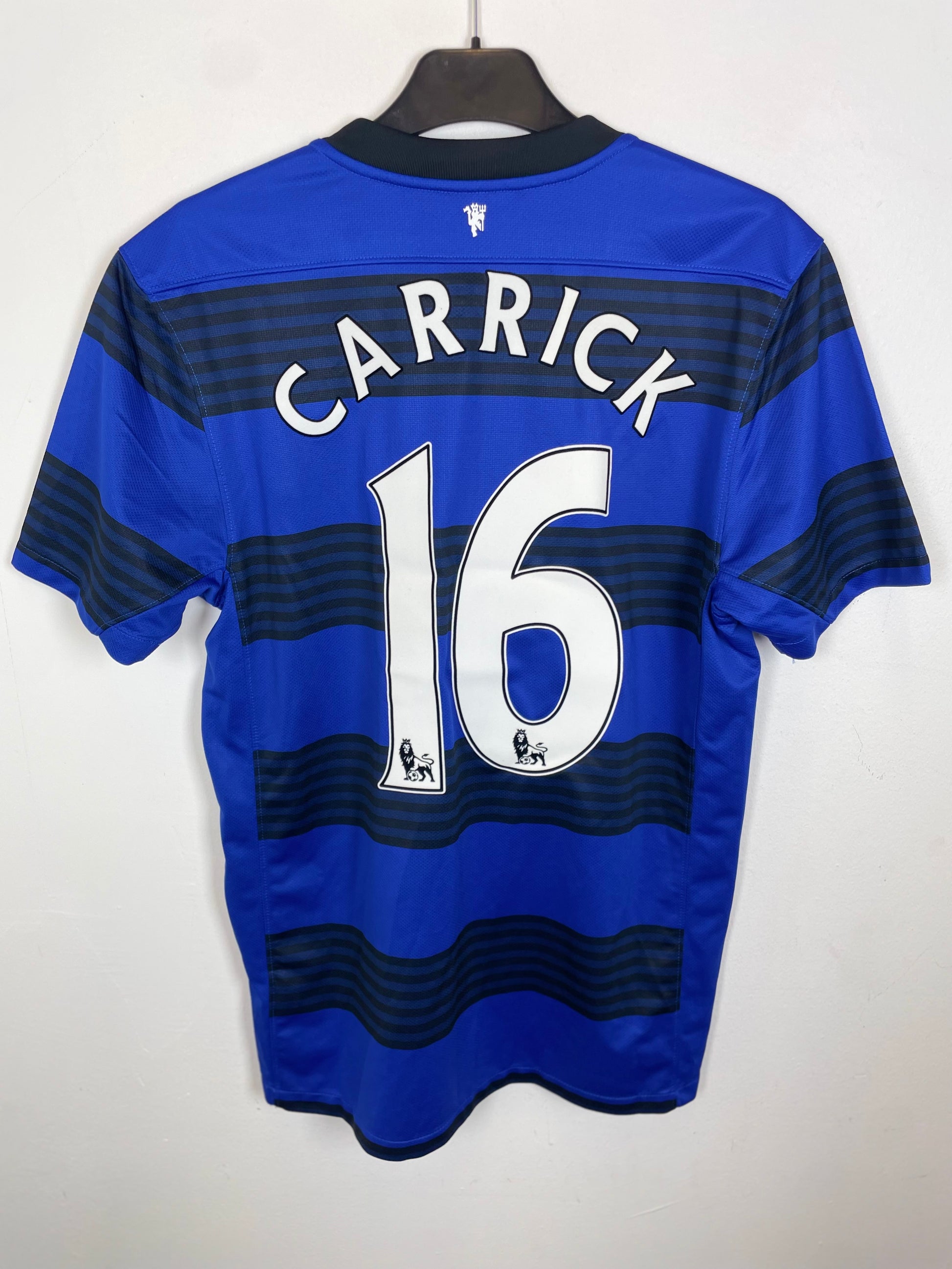 Back view of Nike Manchester United 2011-13 away shirt showing Carrick 16 name and number print