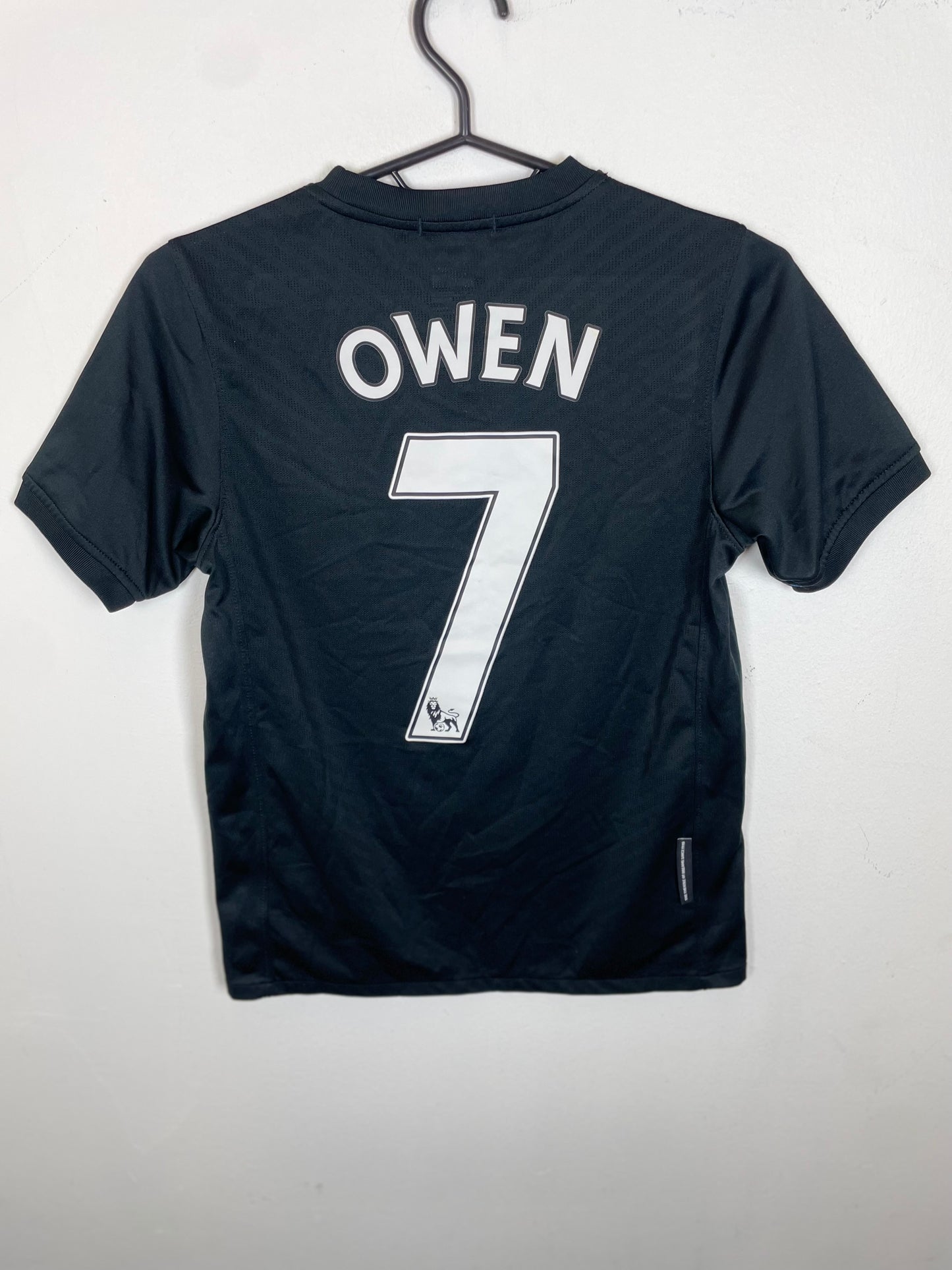 Back view of Nike Manchester United 09/11 away shirt showing Owen 7 name and number