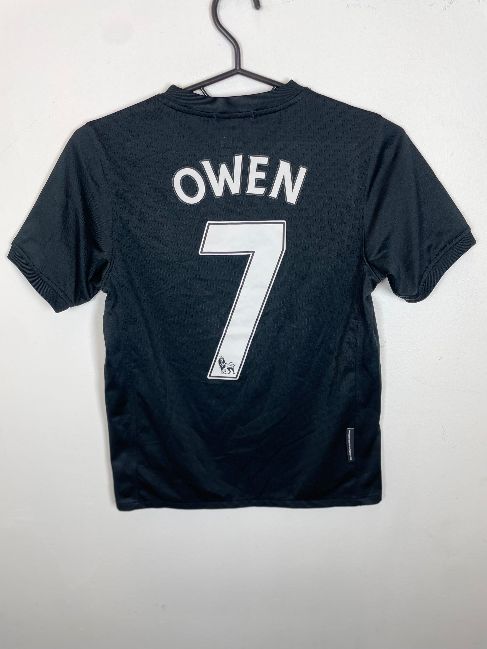 Back view of Nike Manchester United 09/11 away shirt showing Owen 7 name and number