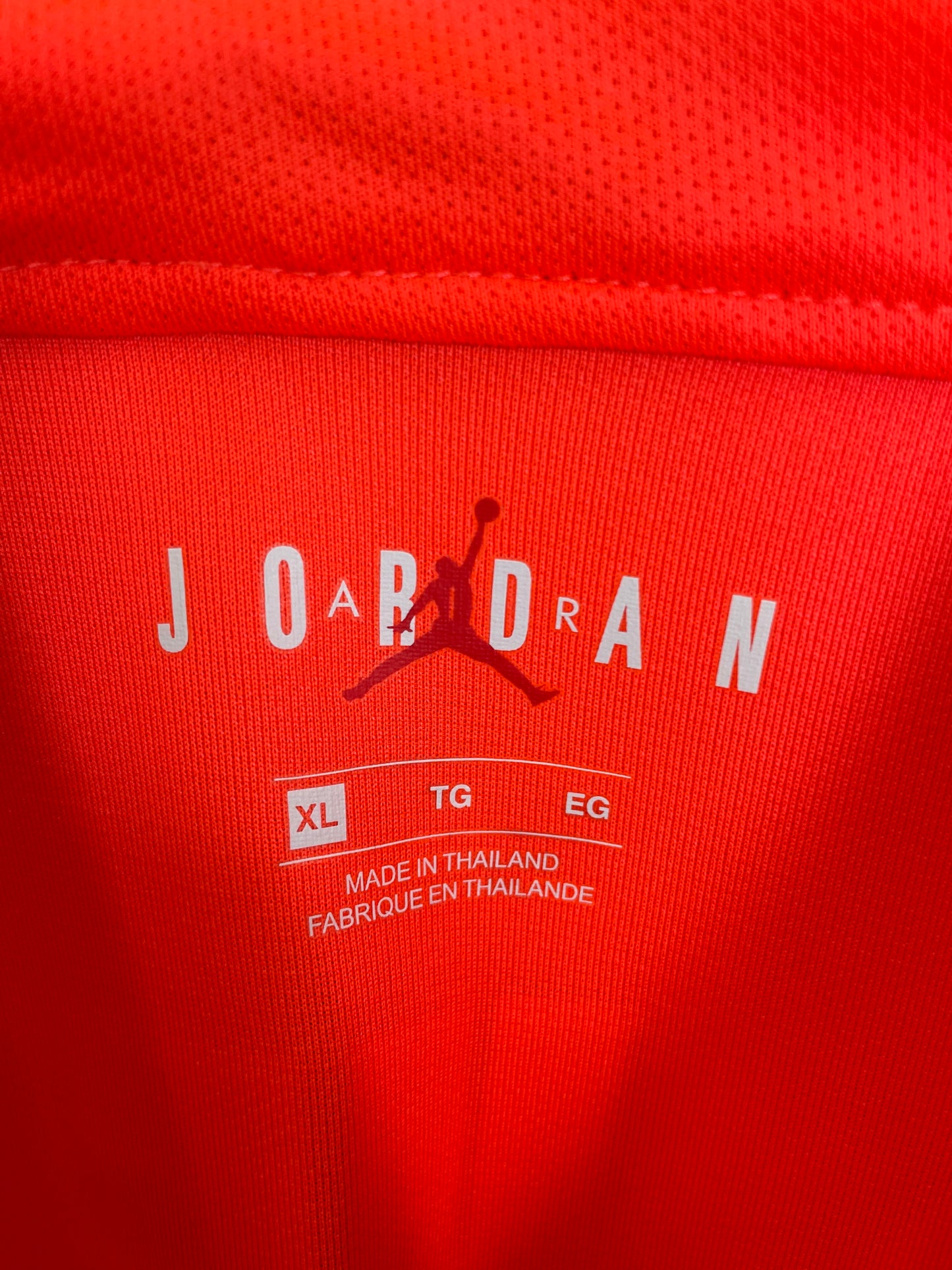 Close-up of PSG club crest and Nike swoosh logo on 2019/20 away shirt front panel