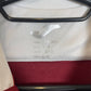 Close-up of Torino FC club badge and logo details on maroon 2022/23 training top for kids