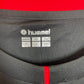 Close-up of Hummel logo and CD Tenerife club badge on 2018/19 third kit in XL