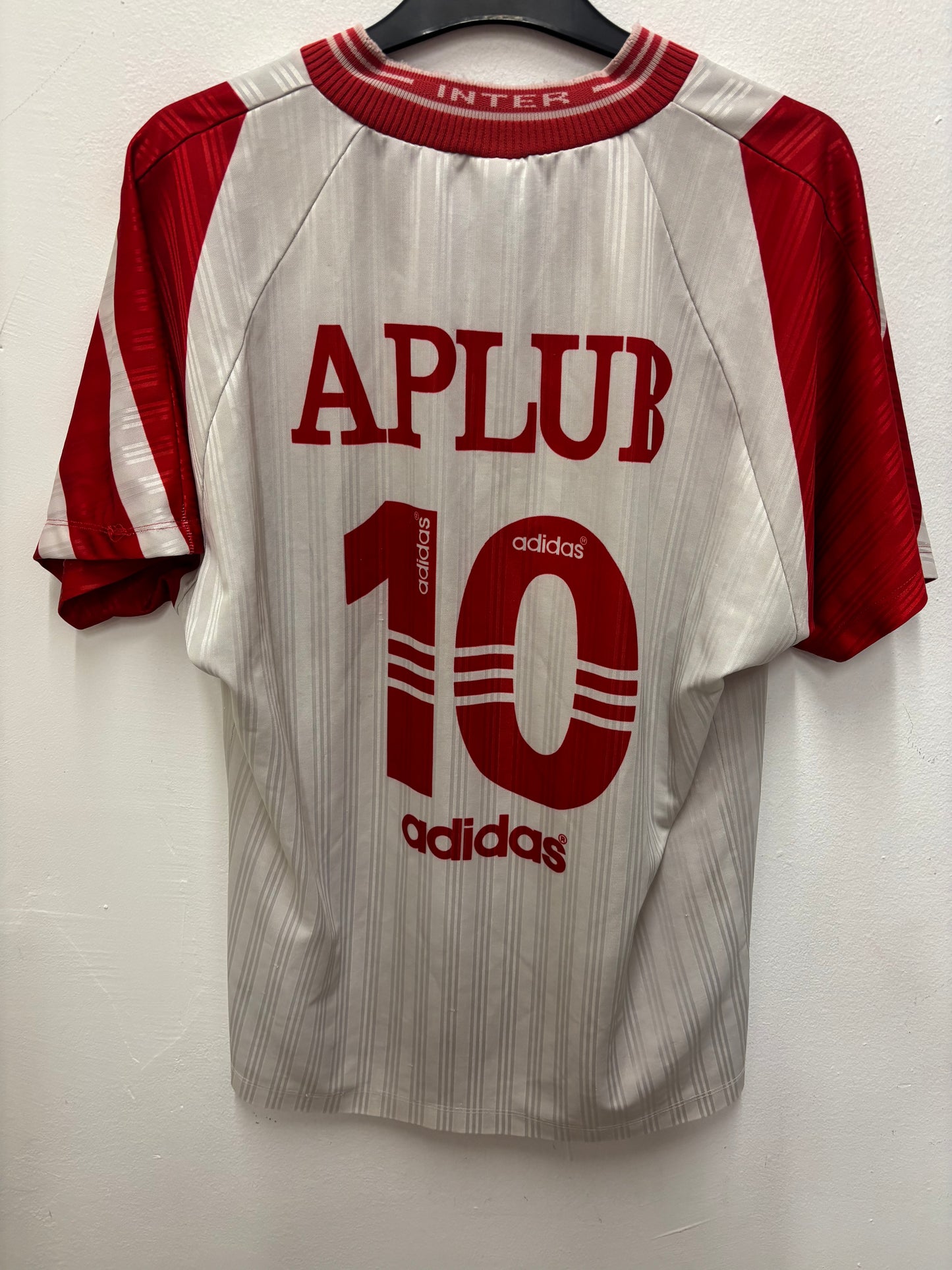 Red and gray retro jersey with 'Aplur' and 'Adidas' branding on a white background