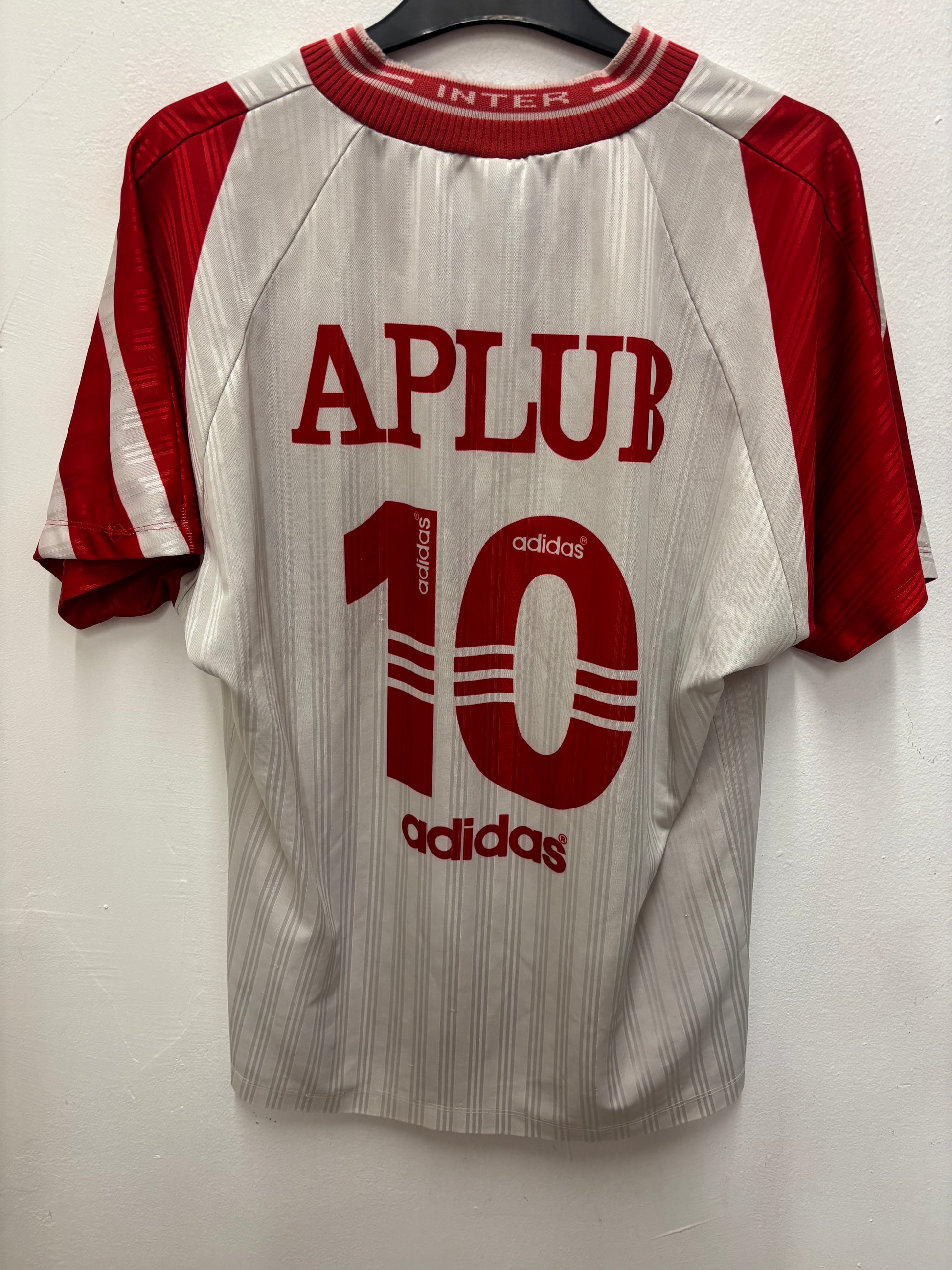 Red and gray retro jersey with 'Aplur' and 'Adidas' branding on a white background