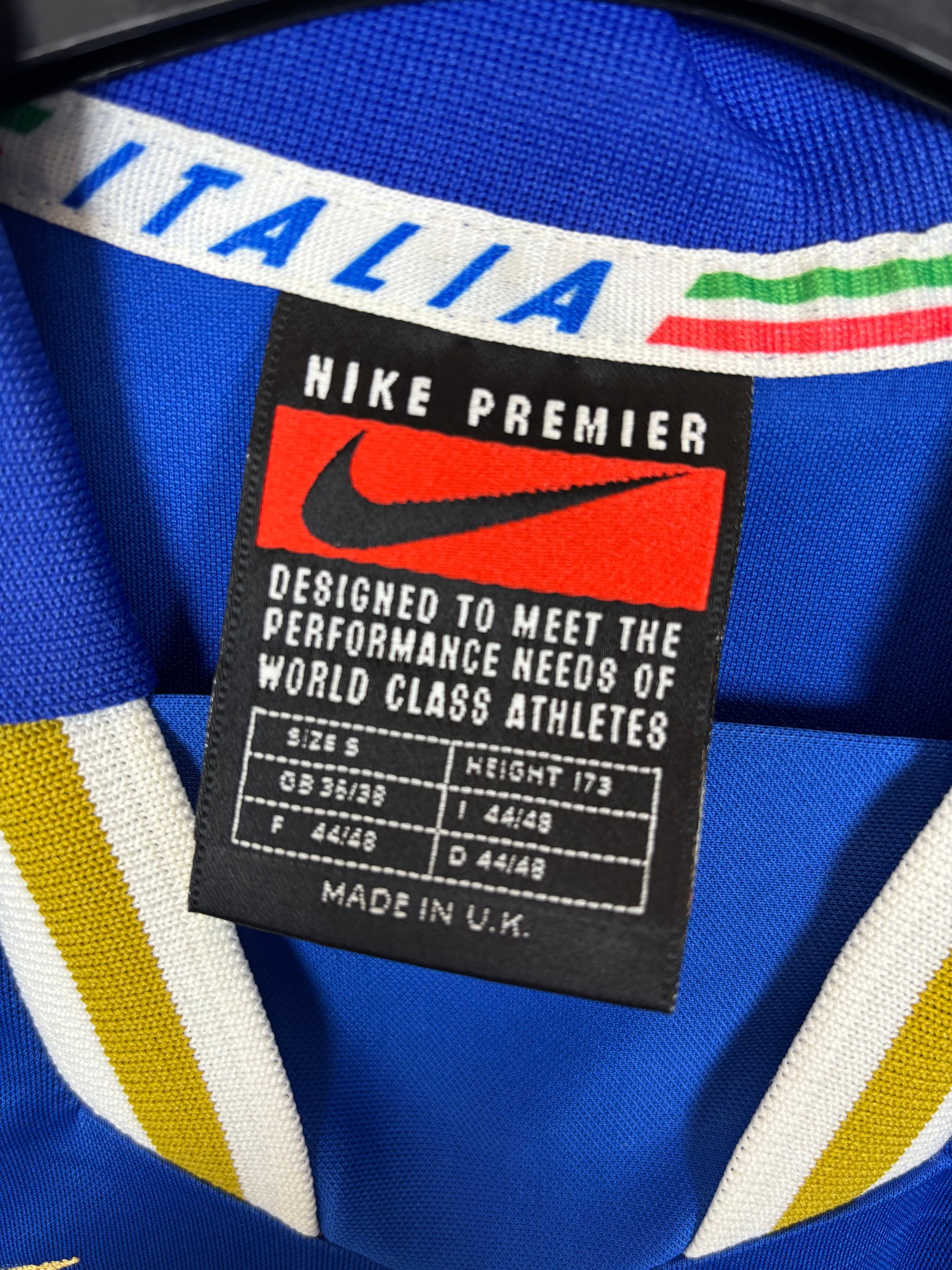 Close-up of Nike logo and Italy national team badge on 1996 blue home shirt with Nesta 6