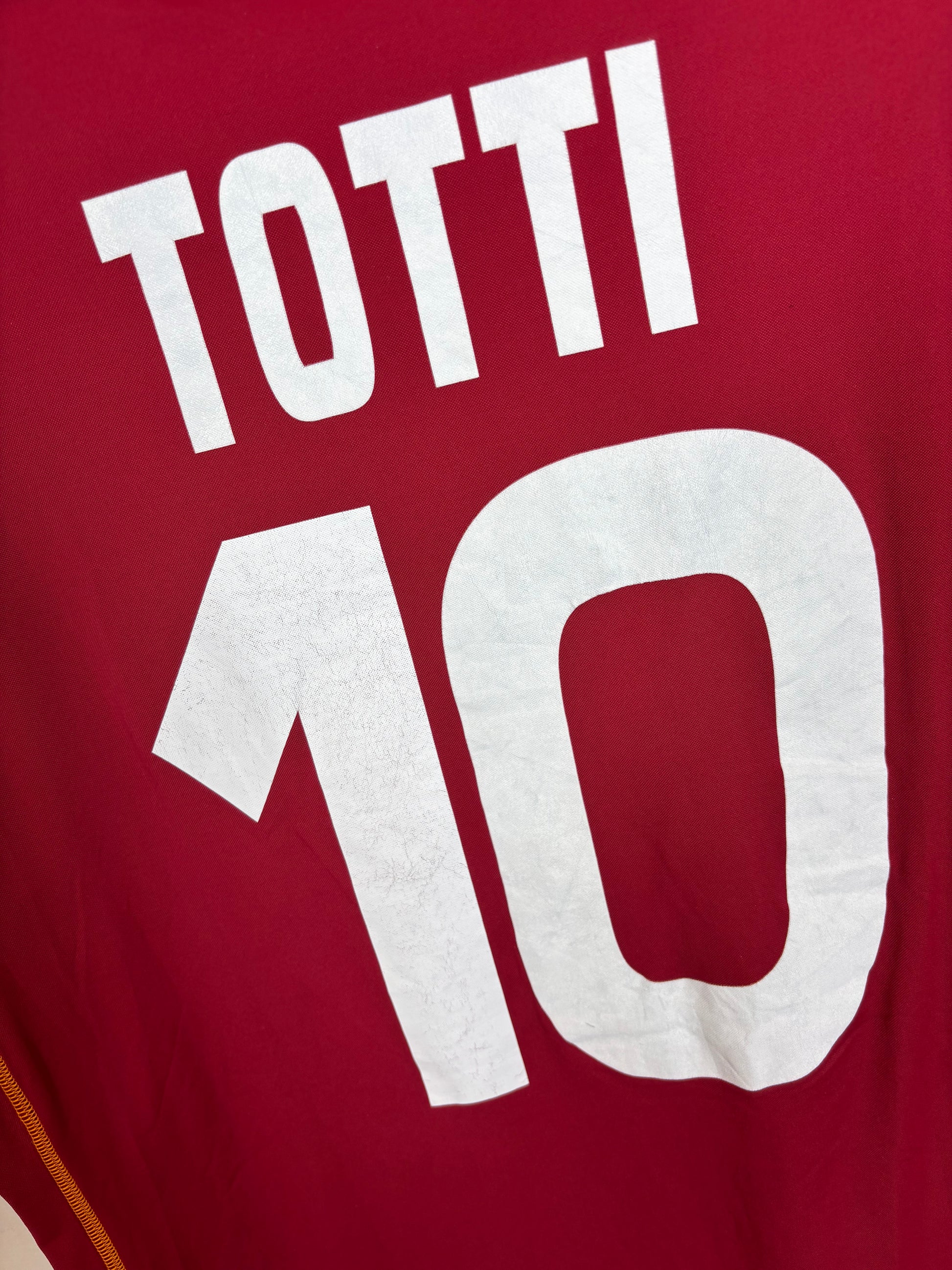 Close-up of AS Roma club badge and Kappa logo on the chest of the 08/09 home football shirt