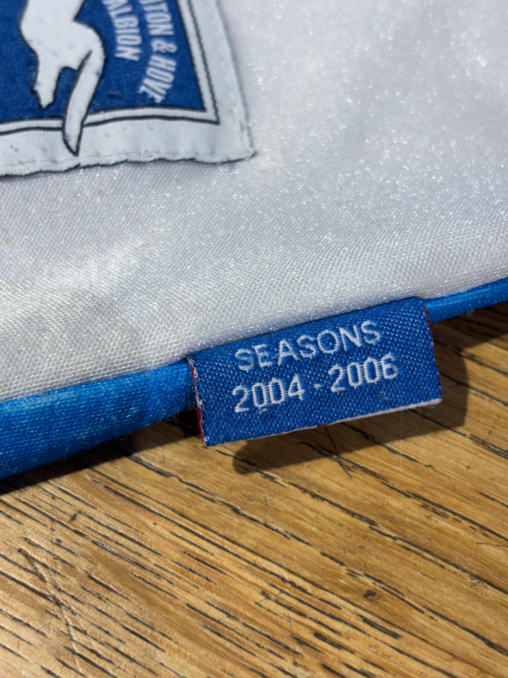 Errea Brighton and Hove Albion 04/06 home shirt size M showing fabric texture and construction details