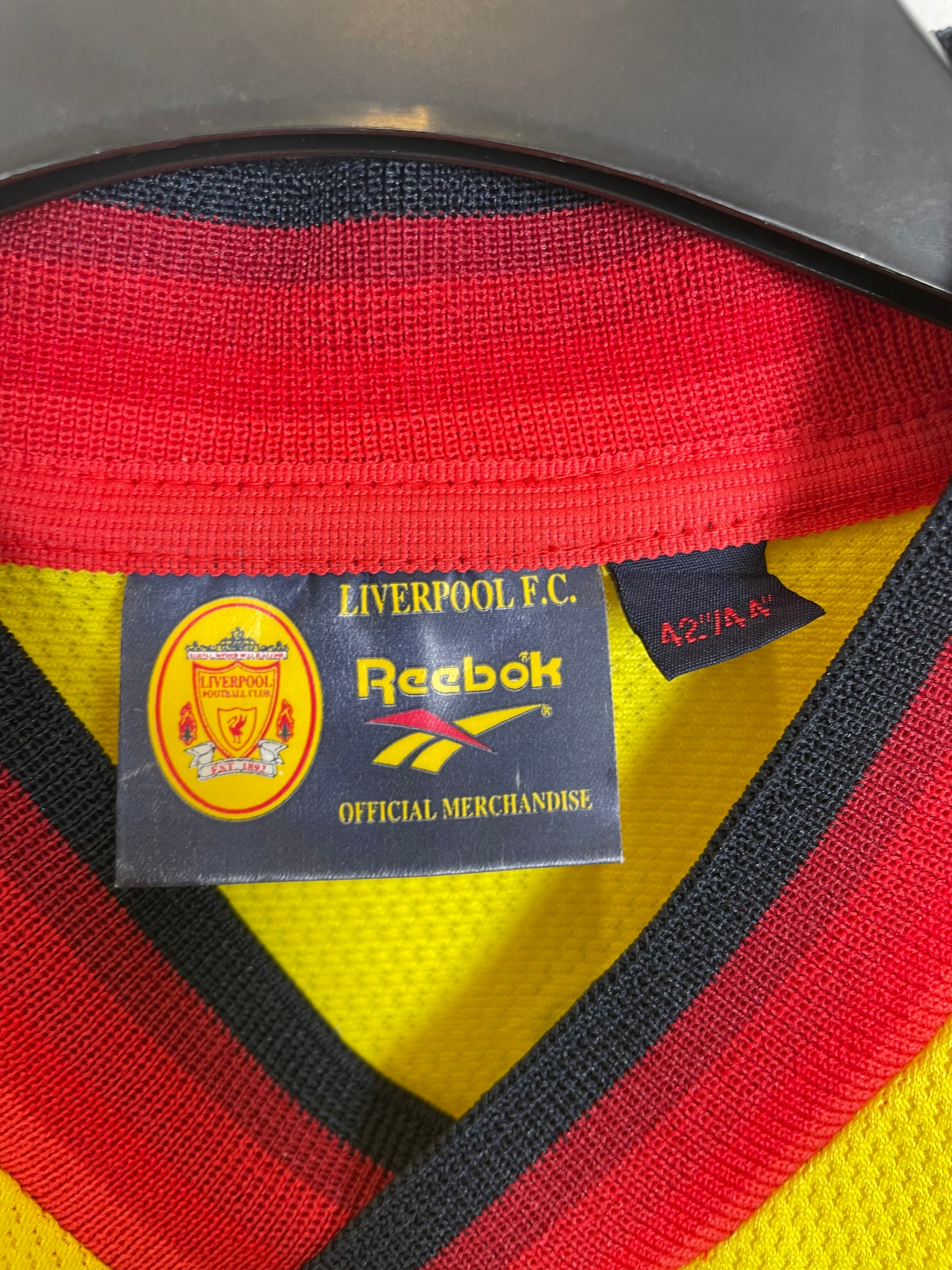 Close-up of Reebok logo and Liverpool club badge on 1997-99 away shirt in excellent condition