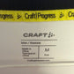 Close-up of Craft logo and Åsane Fotball club badge details on 2025 white away shirt