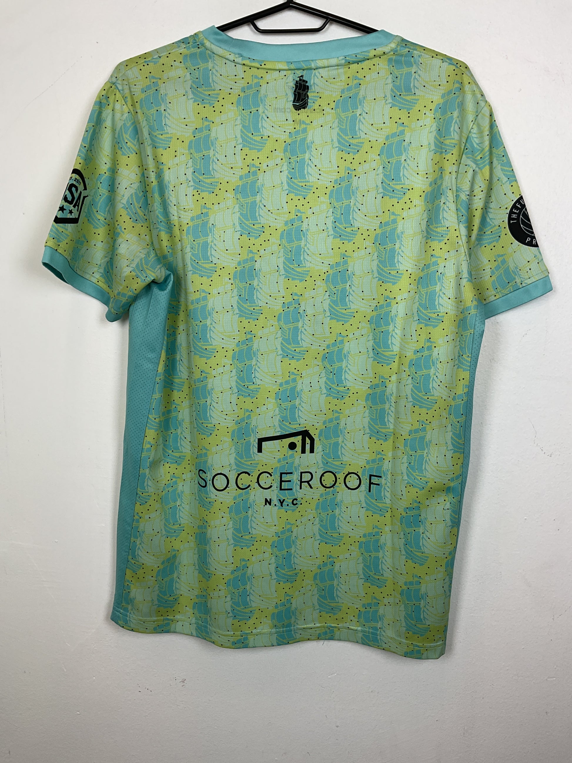 Back view of New Amsterdam third shirt 2021/22 season showing design details and fit