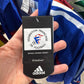 Adidas brand label inside the France 2004 home shirt
