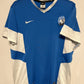 Nike Atlanta training shirt  with Nike logo on a beige background
