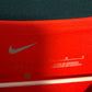 Close-up detail of Liverpool FC club crest and Nike swoosh on 2021/22 Henderson home shirt