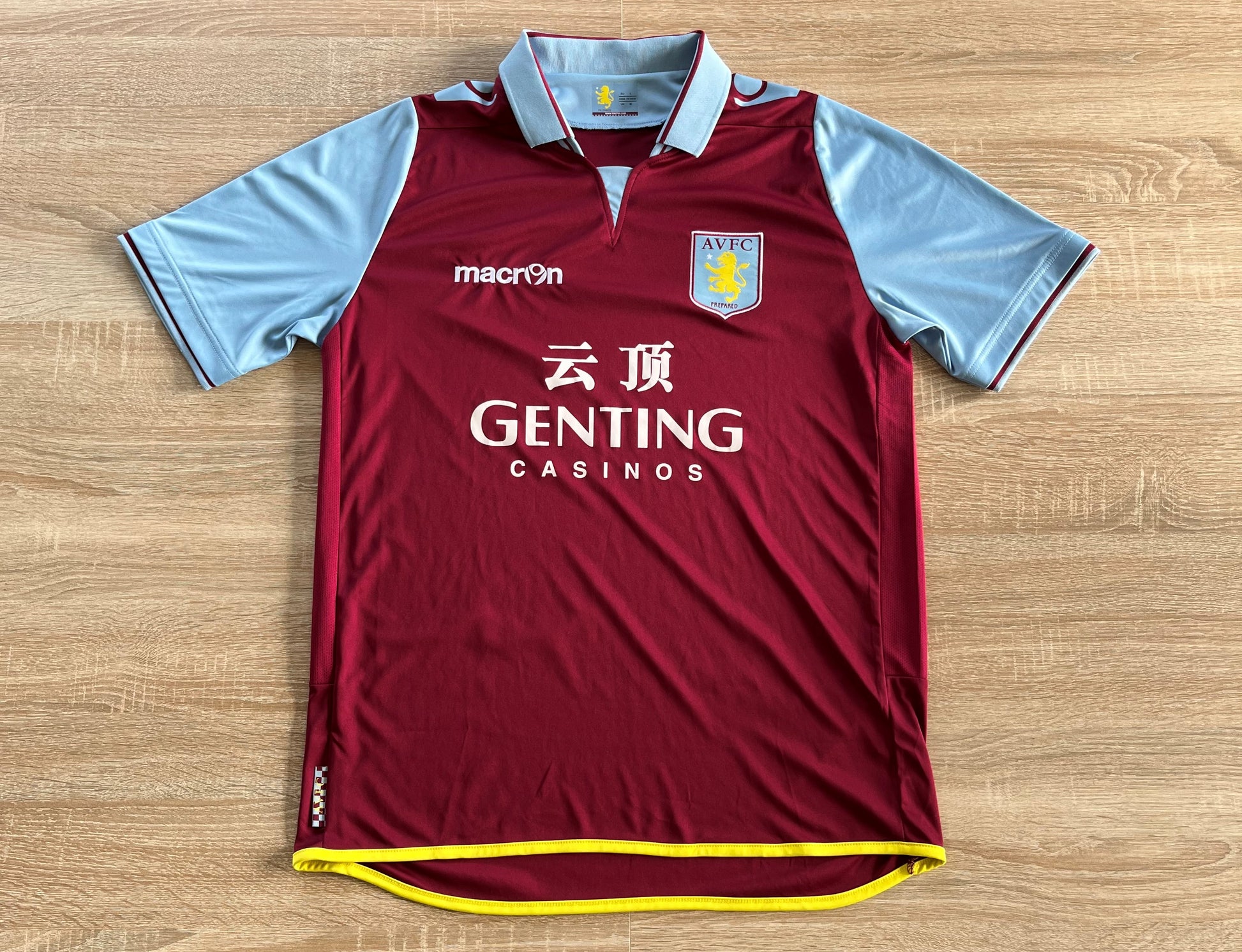 Aston Villa Home Shirt from 2012-2013: The home jersey worn by Aston Villa during the 2012-2013 season. This shirt features the club's emblem and captures the essence of the team's performance and commitment throughout that memorable period.