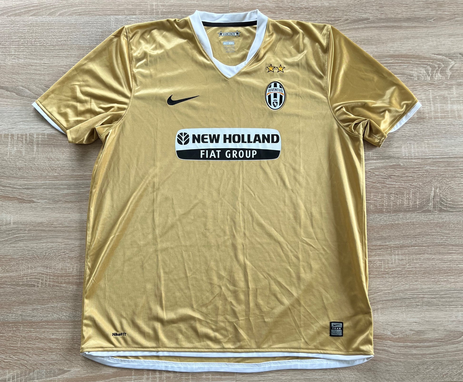 Juventus Away Shirt from 2008-2009: The away jersey worn by Juventus during the 2008-2009 season. With its unique design and the club's emblem, this shirt captures the essence of the team's representation and efforts on the field in that specific period.