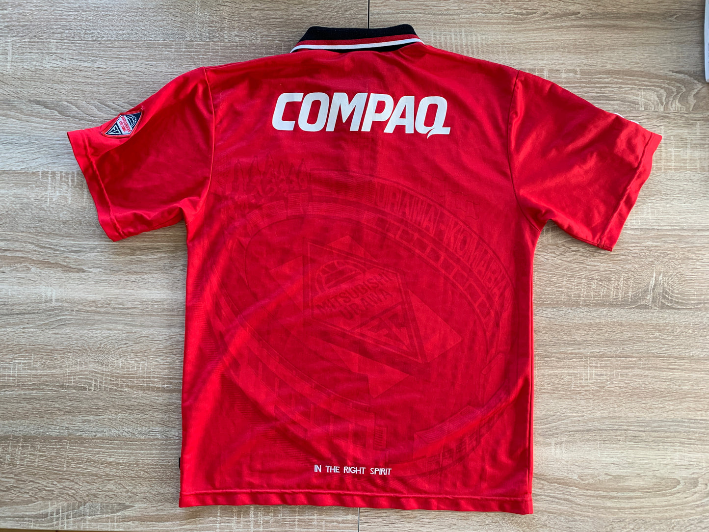 Urawa Red Diamonds Home Shirt from 1997: The iconic home jersey worn by Urawa Red Diamonds during the 1997 season. Featuring the club's emblem, it signifies a memorable era in the team's history and the dedication of their fans.