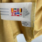 Close-up of the Benfica club crest and Adidas logo on the 04/05 third kit with shorts, detail shot from our store